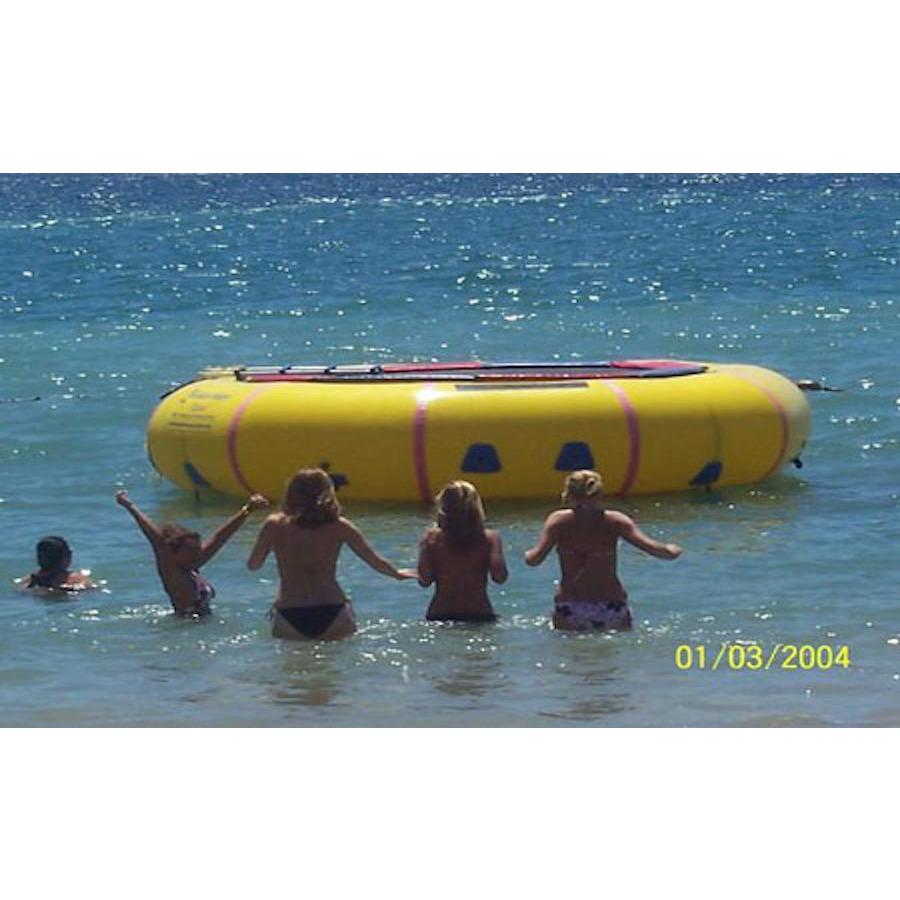Island Hopper 15' Classic Water Trampoline in the ocean with 5 women approaching the inflatable water trampoline.