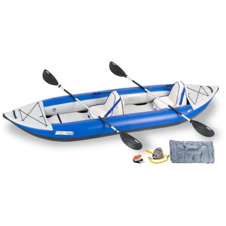 Sea Eagle Explorer 380X Inflatable Tandem Kayak top and side display view with the bag and pump sitting next to the Sea Eagle inflatable kayak. Blue hull with grey highlights. 