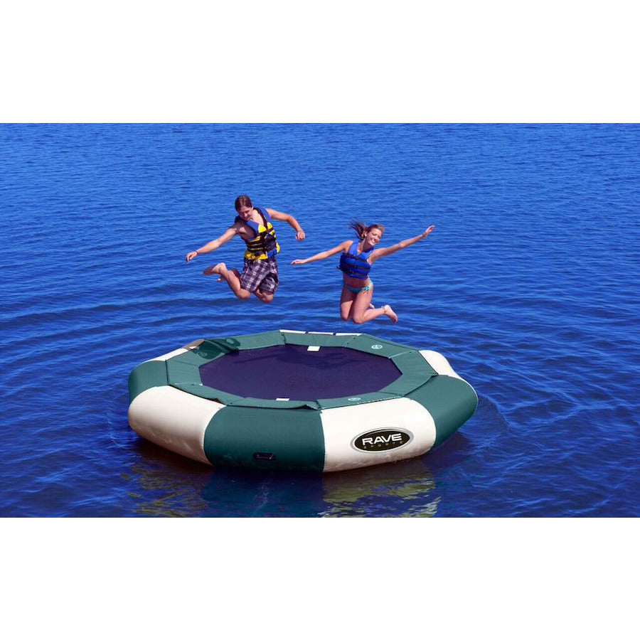 Green and Tan Rave Aqua Jump 120 Eclipse Northwoods Water Trampoline being jumped on by 2 kids on the lake.
