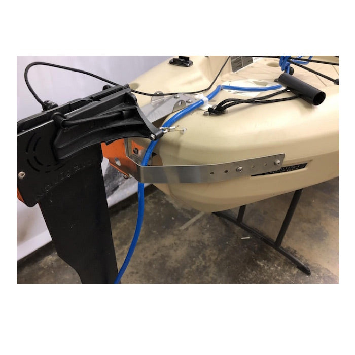 Bixpy WillFit Gudgeon attached to a tan kayak and universal rudder adapter.