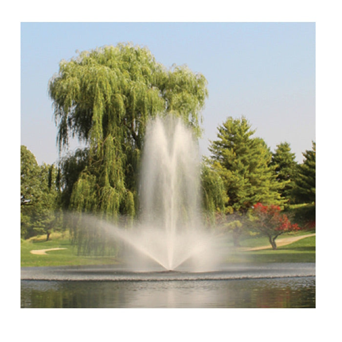 This is the 5 HP 5.3JF Floating Fountain in the middle of the pond in a park-like environment.