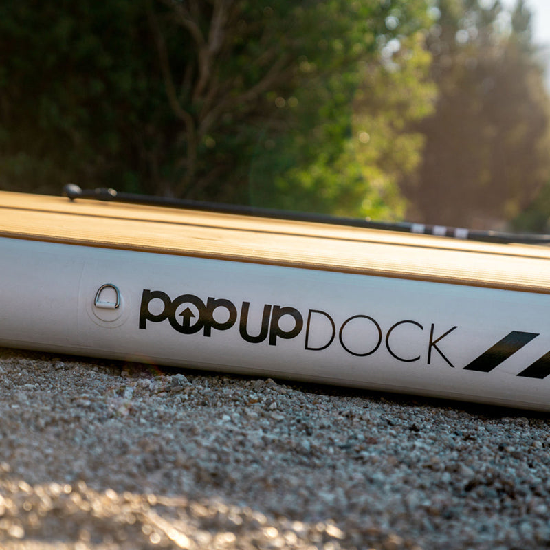 POPUP Inflatable Dock side-view details: logo and D-ring.