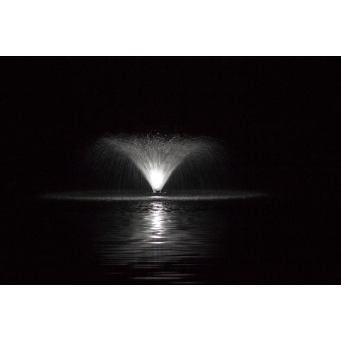 Bearon Aquatics Aerating Fountain with White LED Lights on a lake at night.