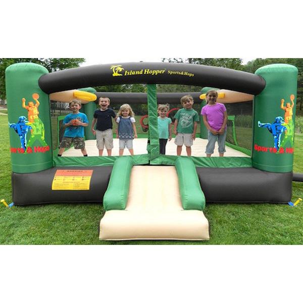 Front view of the Island Hopper Sports and Hops 5 Bounce House with several kids playing inside.