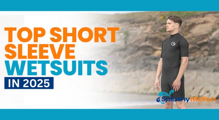Top Short Sleeve Wetsuits in 2025 - Guy in a wetsuit stands calf deep in water showing his wetsuit. Bluff and grass in the background.