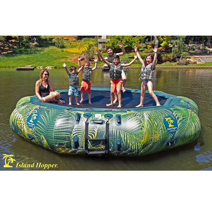 This is the Island Hopper 15ft Lakeside Series Water Bouncer in action on the lake and an adult female sitting on it along with 5 children of various ages playing.