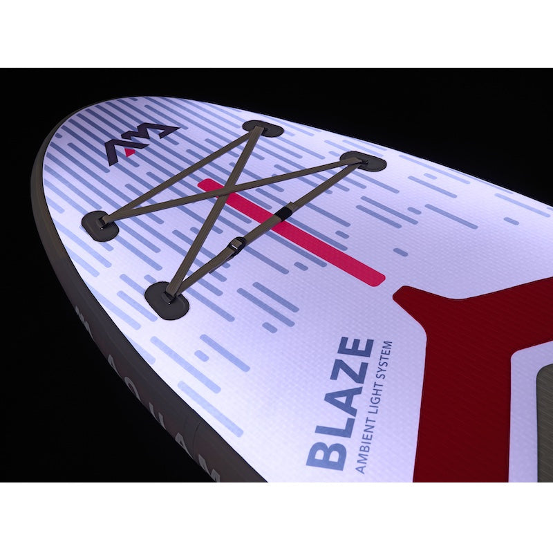 Close-up of a paddleboard with 'Blaze' branding and design elements.