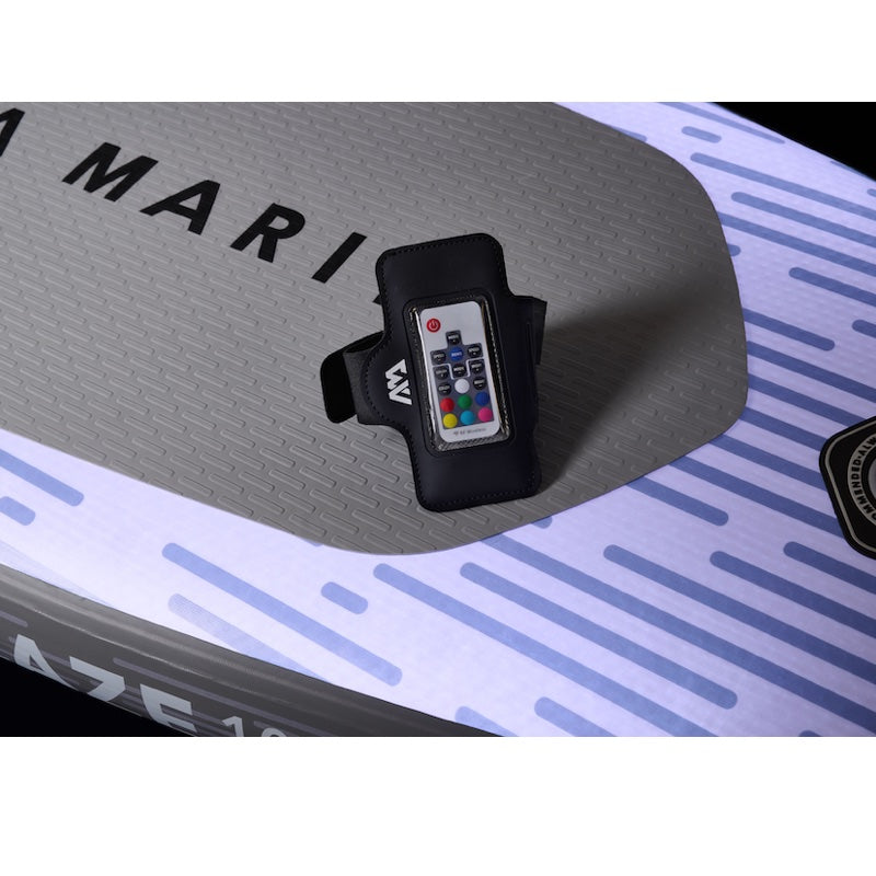 Remote control on a paddleboard with 'Aqua Marina' branding