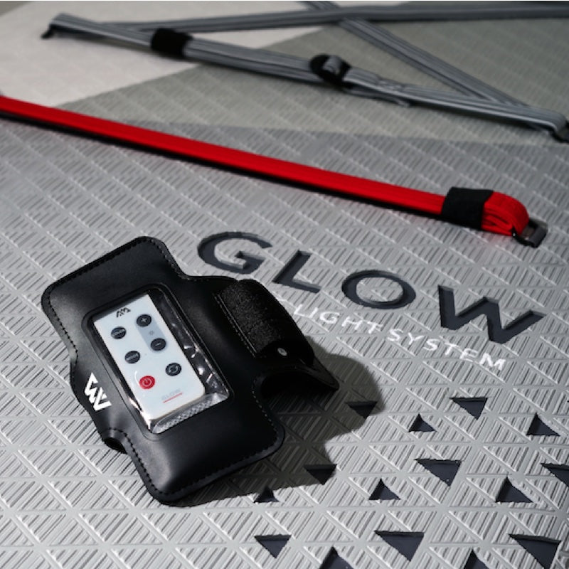 Glow light system controller on a textured surface with 'Glow' branding.