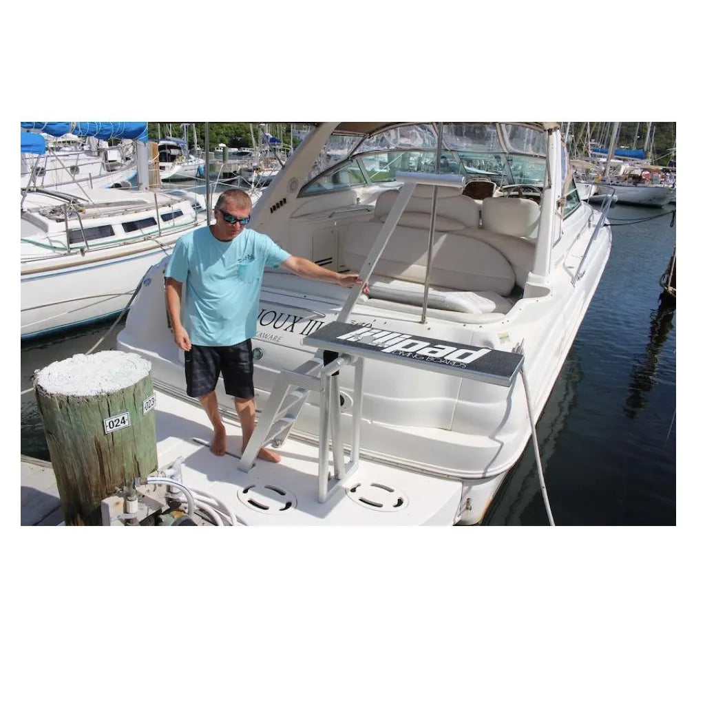 Lillipad Diving Board - Under Floor Mount on display on the back of a docked cruiser. 