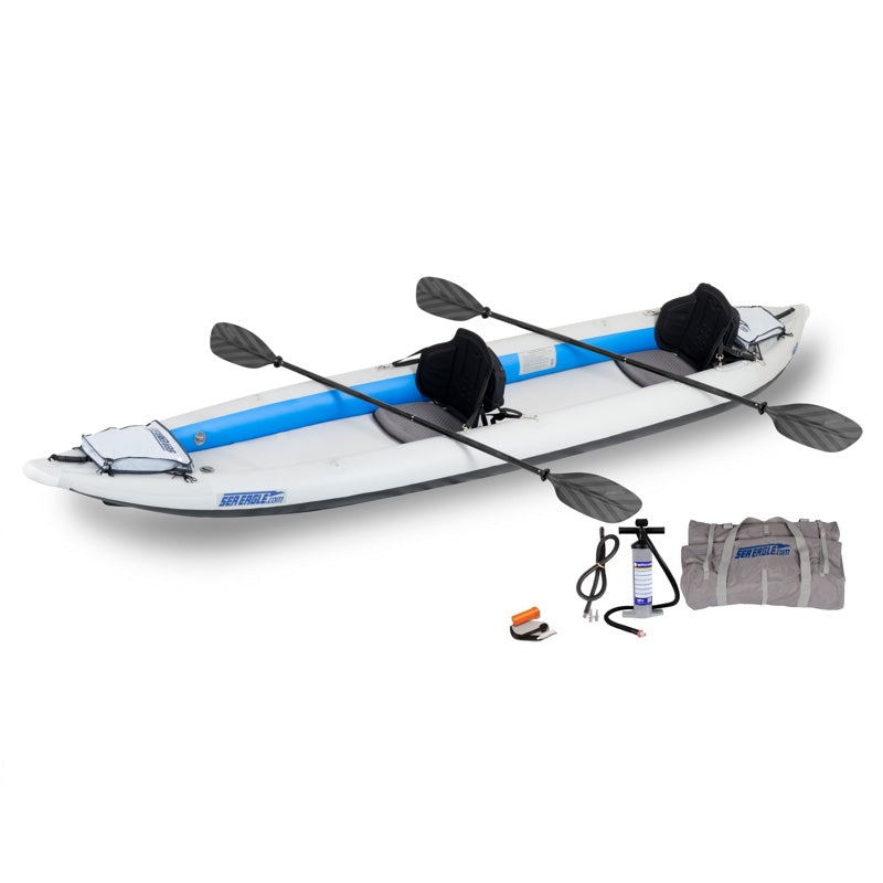 Inflatable kayak with paddles, pump, and seat cover on a white background