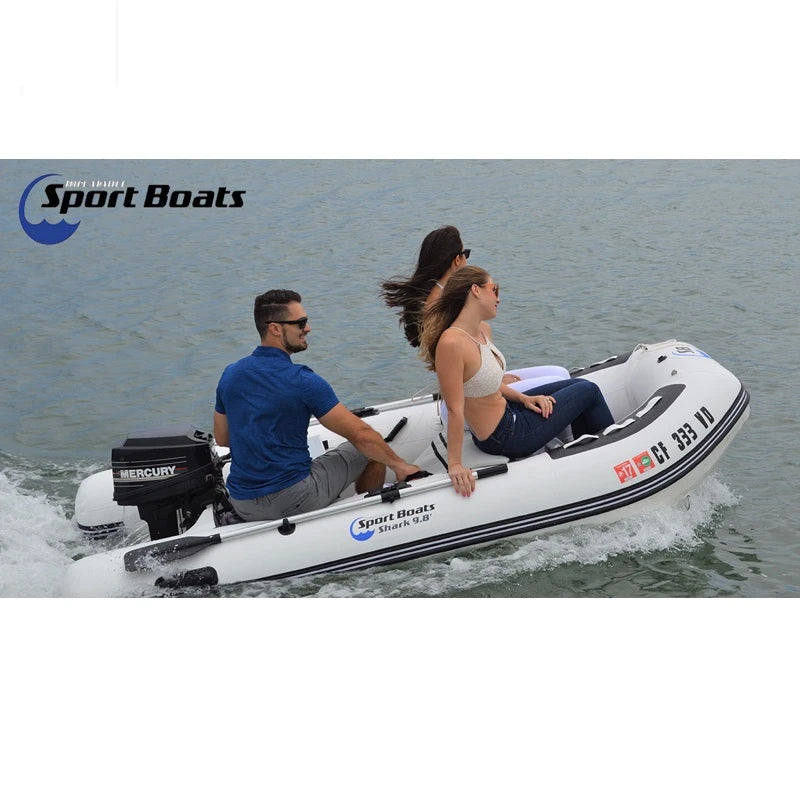 Three people in an Inflatable Sport Boat on the water with a visible logo.