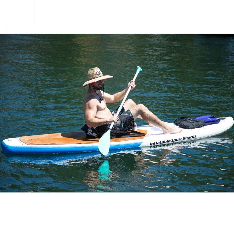 Man paddling an inflatable sport boards paddleboard on the water