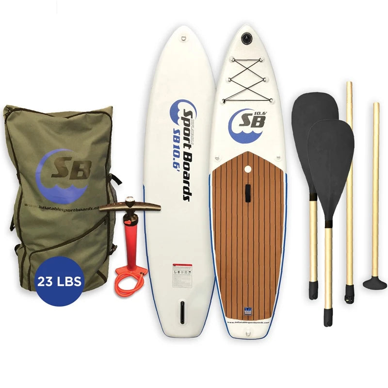Inflatable paddle board with accessories including a backpack, pump, and oars on a white background.