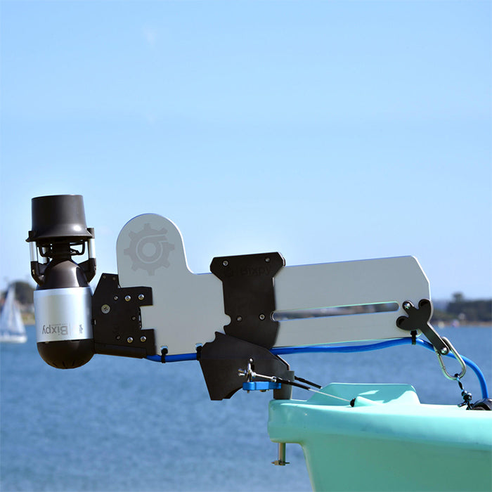 This is the Bixpy Versa Rudder with Pole Steering attached to the boat on the water with a Bixpy motor attached as well.