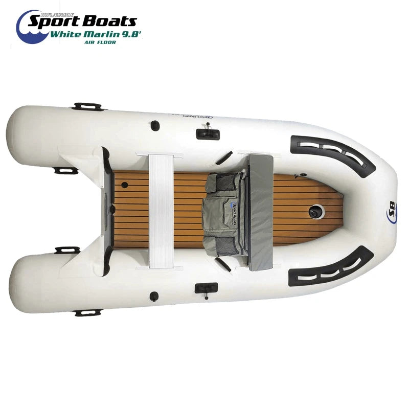 Inflatable boat with textured foam floor on a white background, featuring Sport Boats - White Marlin branding.