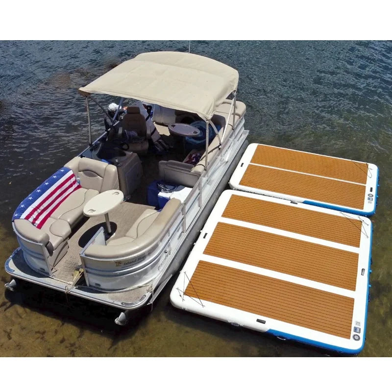 2 Inflatable Yacht Docks attached to a pontoon boat on the water. Overhead view.