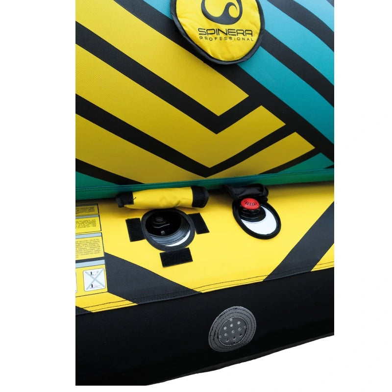 Close-up of a Spinera professional towable tube with yellow, black, and blue design.