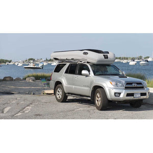 Sea Eagle 10'6" Sport Runabout Inflatable Boat upside down on the roof an SUV.