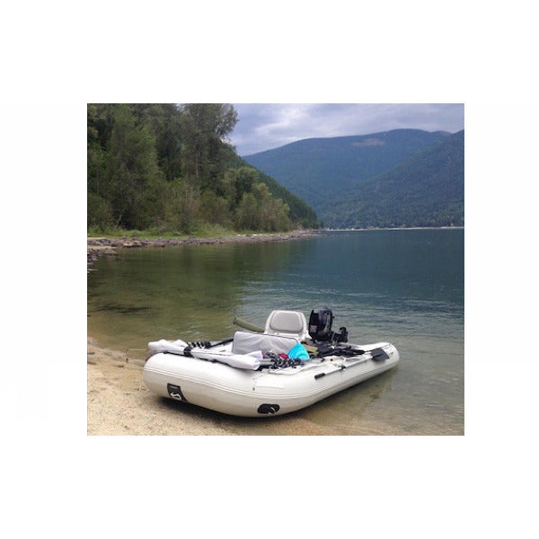 Sea Eagle 10&#39;6&quot; Sport Runabout Inflatable Boat on the beach of a lake. 