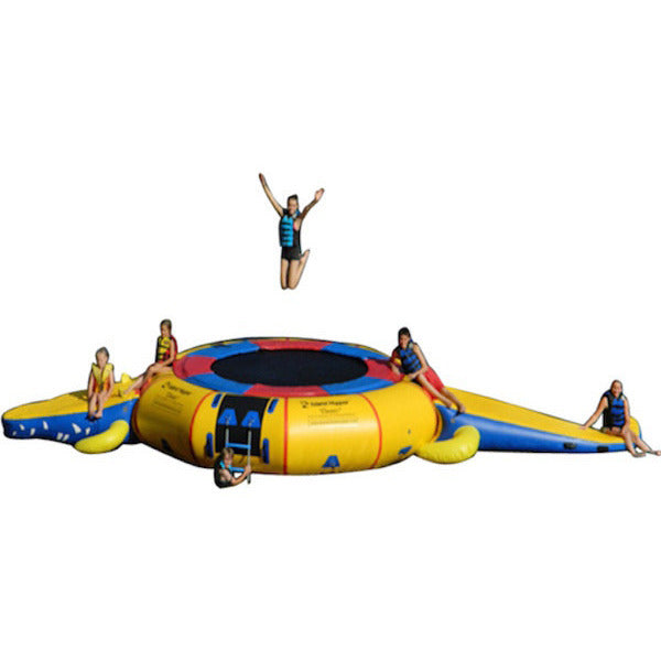 Yellow Island Hopper 15&#39; Gator Monster Water Trampoline Water Park with blue and red trim on a white background.  4 Kids sitting on the inflatable water park and 1 kid jumping on the water trampoline. 