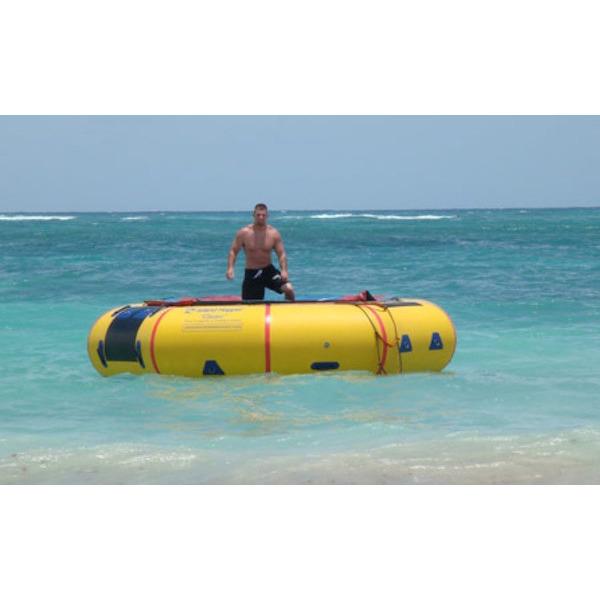 Island Hopper 15&#39; Classic Water Trampoline on the ocean with a man jumping on the inflatable water trampoline. 