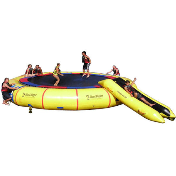 Kids playing on the Island Hopper 25&#39; Giant Jump Water Trampoline on a white background.