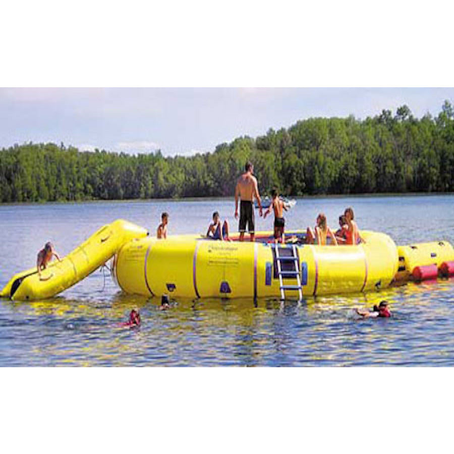 Island Hopper 25' Giant Jump Water Trampoline being played on by several young kids on the lake with water slide and aqua log attachments.  Yellow water trampoline and yellow water trampoline attachments. 