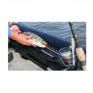 A fish being measured on the measuring tape attached to the Sea Eagle 350fx Inflatable Fishing Kayak.