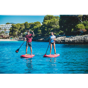 Mira 10.6 Inflatable Paddle Board in action on the waters with 2 adults stand-up paddling on their respective boards.