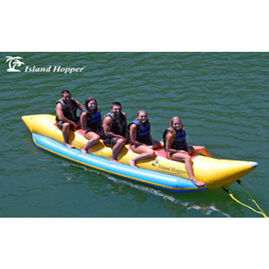 Top/Side view of the Island Hopper 5 Person Banana Boat Tube.  5 kids sitting on the inflatable banana boat tube ready to be pulled on the water. 