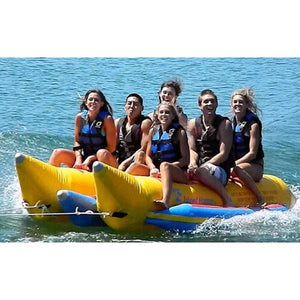 Island Hopper 6 Person Towable Banana Boat Tube front view, full of kids out on the lake. Yellow with blue trim. 
