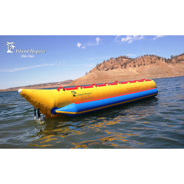 Island Hopper 8 Person Towable Banana Boat Tube front side view of an unoccupied 8 man banana boat sitting on the lake. 