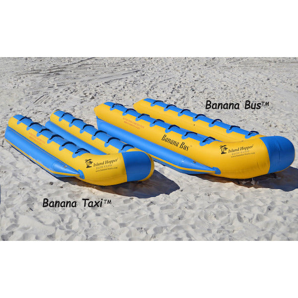 Comparison picture of the Island Hopper 12 Person Towable Banana Boat Taxi and the 14 person Banana Bus sitting side by side on a beach.  Yellow and blue banana boats.