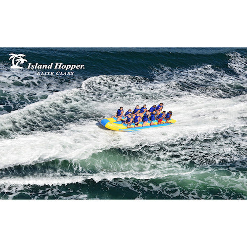 Island Hopper 12 Person Towable Banana Boat Taxi front right close up view of the yellow and blue 12 man banana boat in action on a white background. 