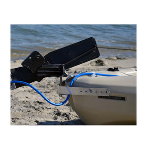 Bixpy WillFit Gudgeon attached to a tan kayak and universal rudder adapter. Side view.