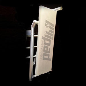Lillipad Diving Board Cover - Light Grey with the Lillipad Diving Board logo in dark grey.  Display picture against a black background.  Also known as Lily Pad Diving Board, boat diving board cover.