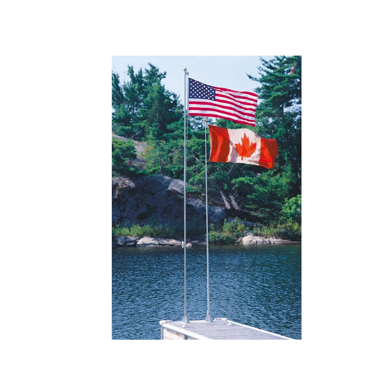 Dock Edge 21 foot Flexi-Flagpole with Canadian flag flying in the wind. On a dock on a lake.