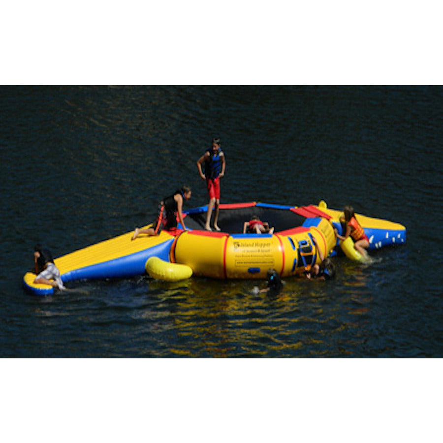 2 girls sitting on a Island Hopper Gator Monster Tail Platform Slide Water Trampoline Extra