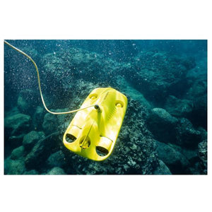 Top view of a Chasing Gladius Mini Underwater Drone sitting on a reef.  The yellow underwater drone for sale and the yellow tether are clearly visible in the crystal clear water.