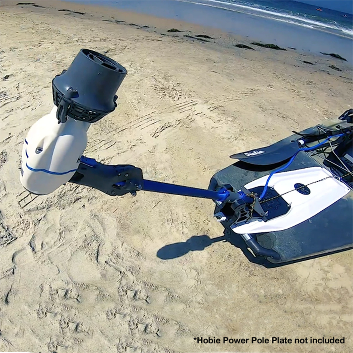 Hobie Pro Angler Compass Outback Power Pole Adapter fully hinged and out of the water attached to the kayak on the beach.