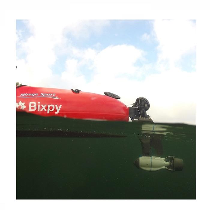 Closeup of the Bixpy Hobie Twist & Stow Kayak Rudder Adapter in place on a red Hobie kayak and underwater ready to prope.