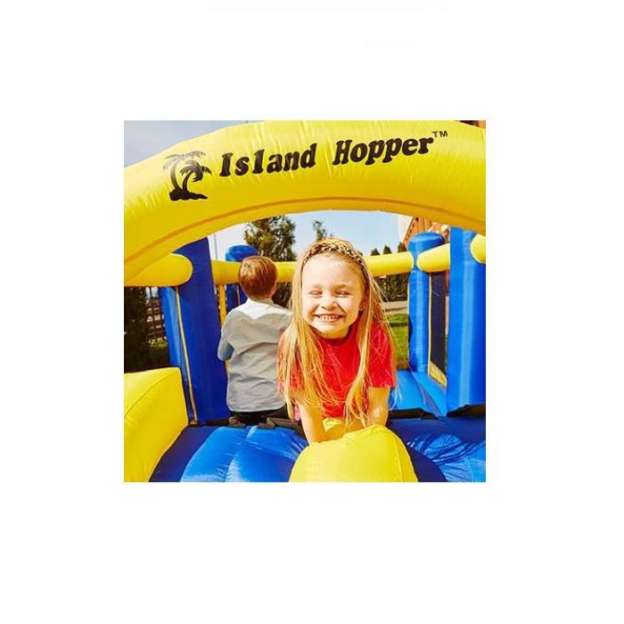 Island Hopper Racing Slide and Slam Bounce House girl and boy playing in the bounce house