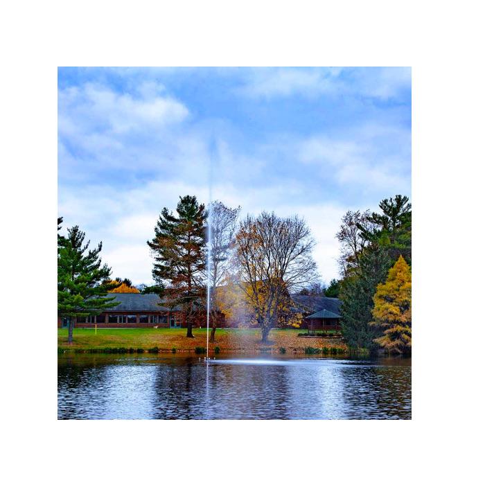 Scott Aerator Jet Stream 3 HP Pond Fountain sprays a beautiful 80ft columnar spray into the air from the middle of a pond.  It is fall and beautiful against the changing colors.