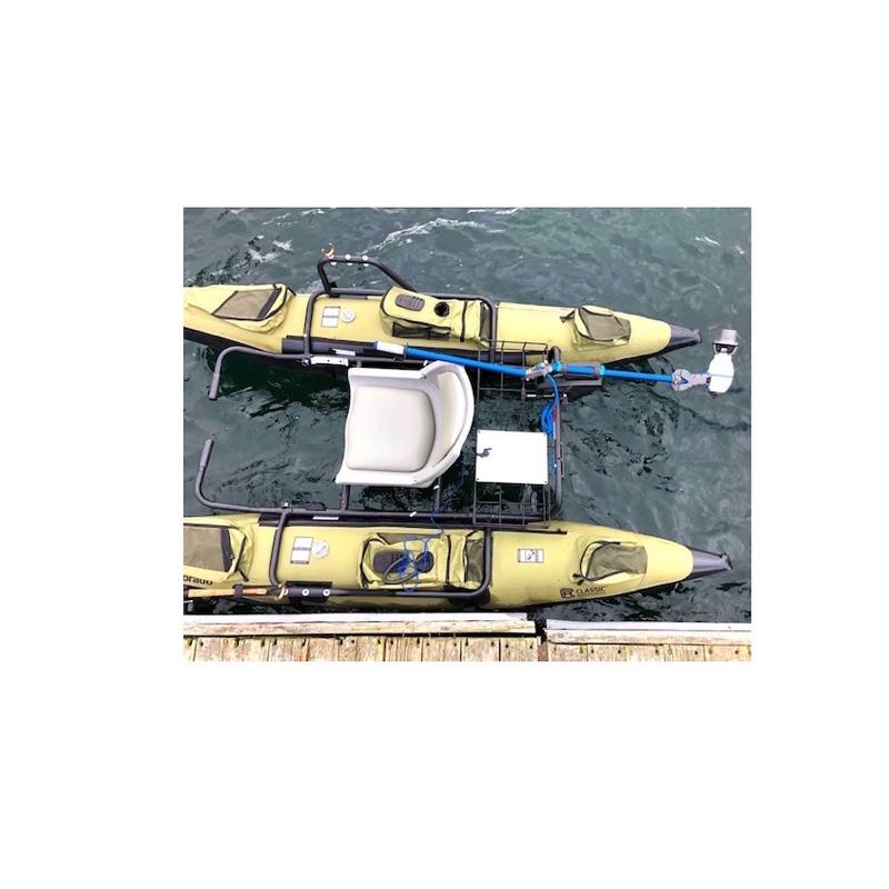 Bixpy Jet Kayak Motor Outboard Power Pack Kit is used on an inflatable pontoon boat with the Bixpy Universal Transom Adapter.  The yellow pontoons are joined together by a middle seat and frame.  The 333 Outboard Kayak Motor Power Pack sits behind the seat in a storage cage.