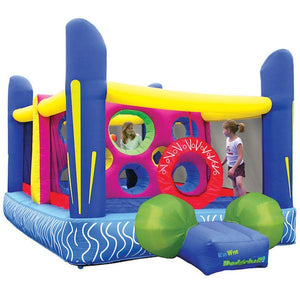 KidWise Jump'n Dodgeball Sports Bounce House display image on white background.  Blue base with 4 big blue inflated support post in each corner.  Yellow cross bar connects the supports.  Green balls adorn the side of the entry ramp.  You can also see the middle partition with round spaces for throwing and climbing, it is violet.  Kids are also playing inside.
