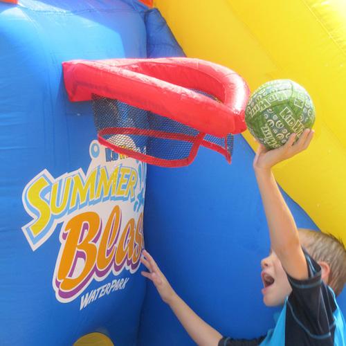 KidWise Summer Blast Waterpark basketball hoop on display with kid dunking