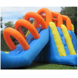 Back and side view of the KidWise Summer Blast Waterpark showing a slide and climbing wall\
