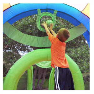KidWise Arc Arena 2 Inflatable Sports Bounce House with young kid playing on the mesh basketball hoop.