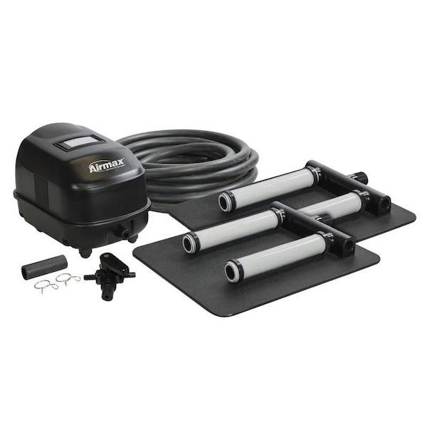 AirMax KoiAir 2 Aeration Kit.  The black aerator pump is shown along with a roll of the 3/8" tubing.  The 2 black dual stick diffuser plates are also pictured, the diffusers are light gray.